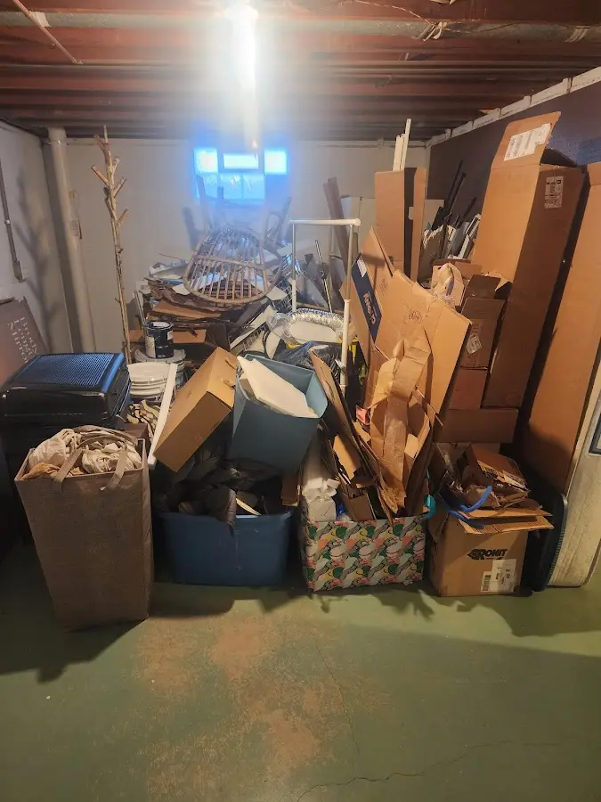 Roll-off dumpster container at job site for Construction Dumpster Rental in Palacios